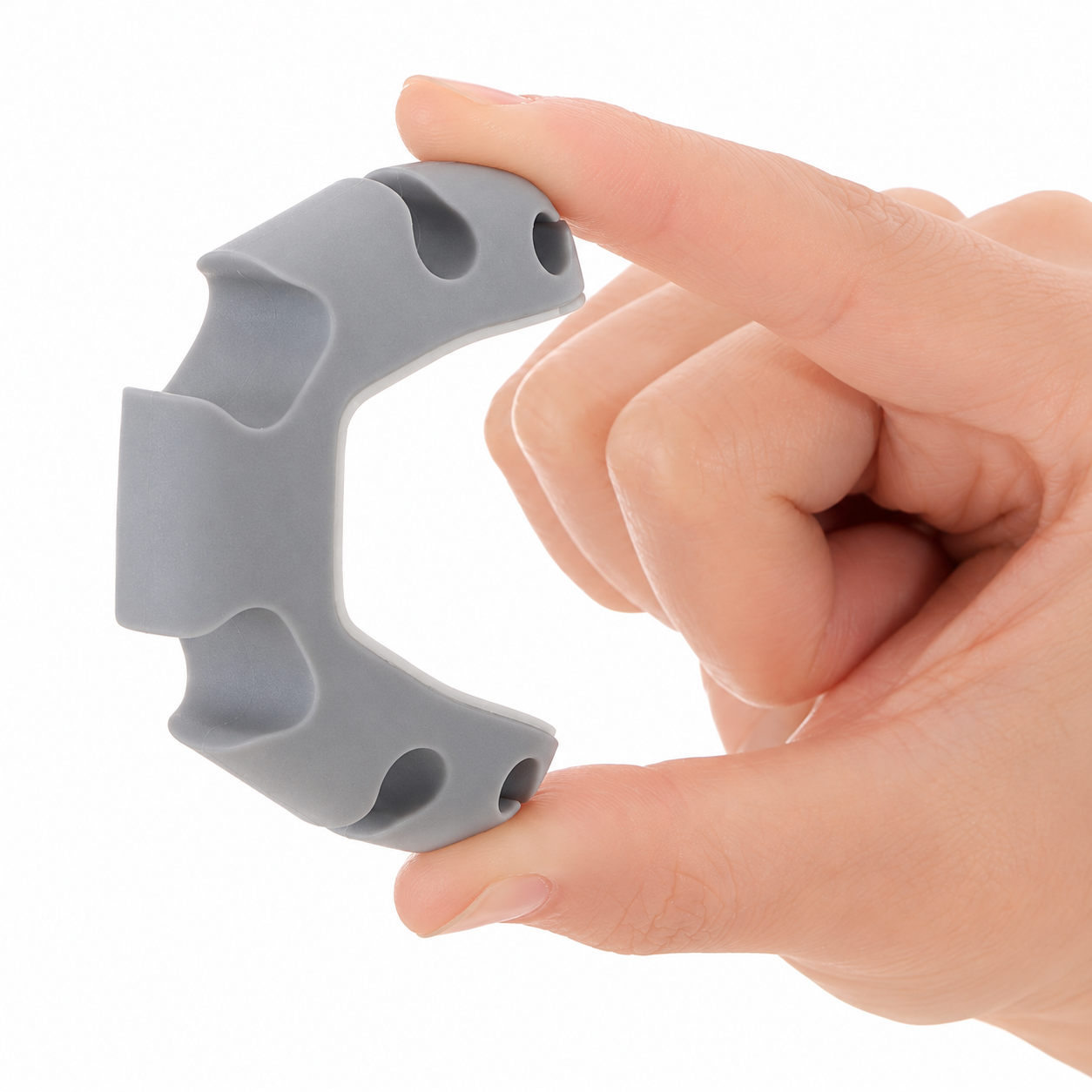 Retouched image of fingers bending a gray cable holder