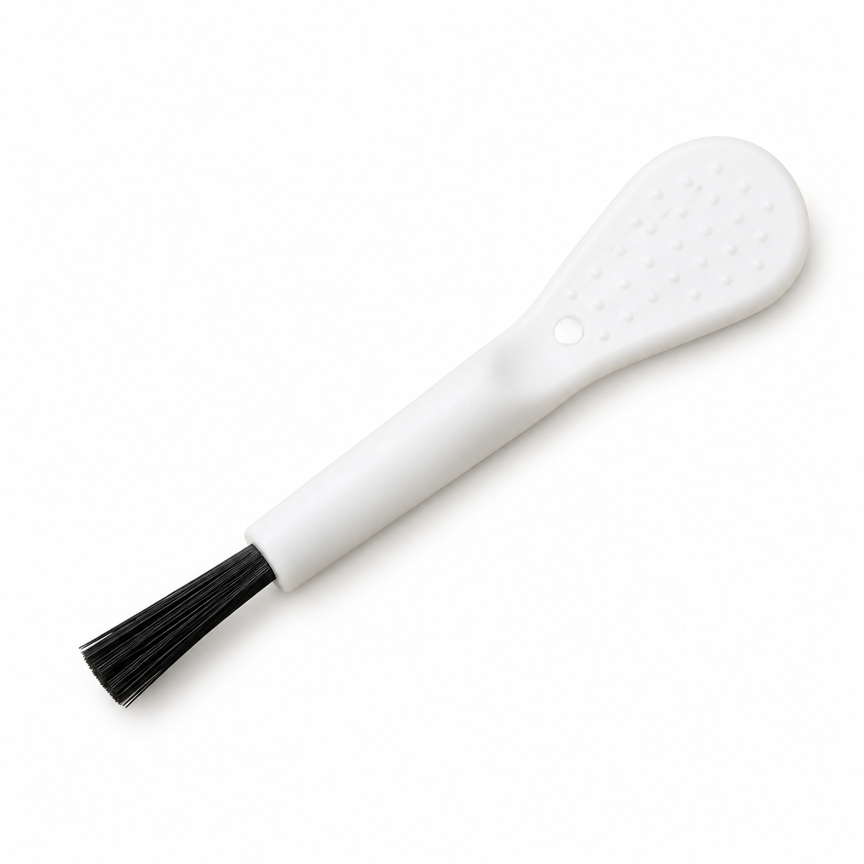 Retouched image of the mini white-handled dusting brush with black bristles